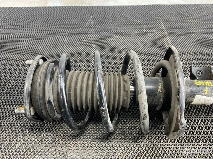 Амортизатор передний левый Mazda Mazda 3 BP PE