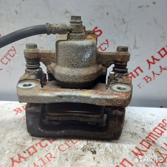 Суппорт тормозной задний правый Mazda Cx7 CBA 2.3