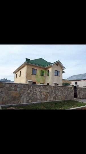 Коттедж 394 м² на участке 12 сот.