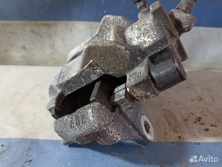 Суппорт тормозной передний правый Renault Sandero