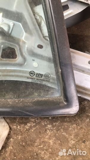 Стекло двери задней левой (форточка) Hyundai Santa