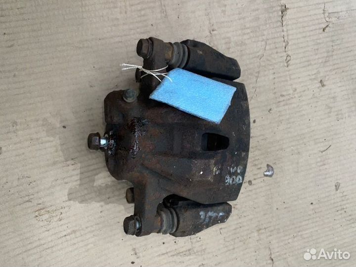 Суппорт тормозной передний левый Toyota Corolla