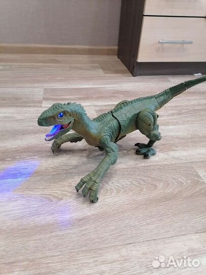Игрушка динозавр