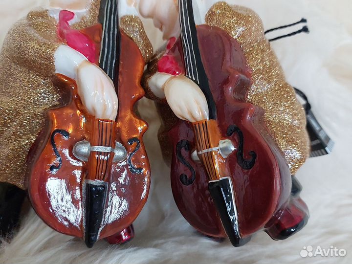 Виолончелист елочная игрушка Моstowski