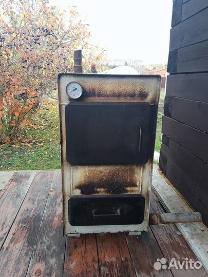 Твердотопливный котел бу Каракан