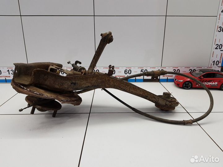 Рычаг задний левый продольный (Mitsubishi Lancer)