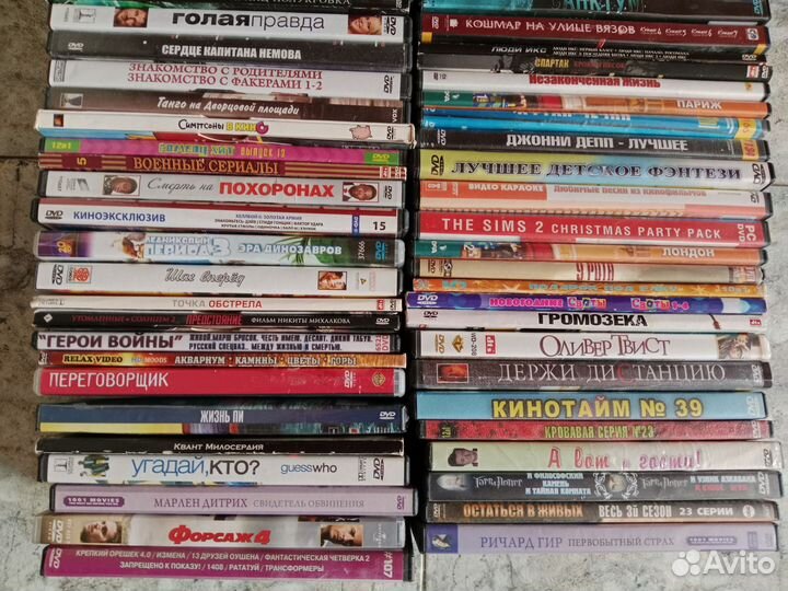 64 DVD диска, в основном, с фильмами