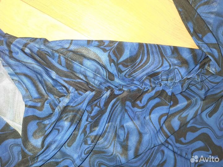 Синяя кофточка в сетку