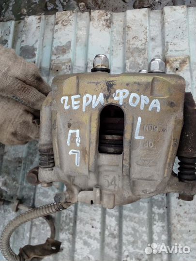 Суппорт передний левый Chery Fora A21 06-10