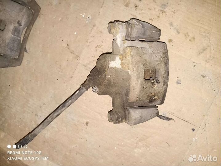 Суппорт правый передний Kia Spectra 2011г б.у