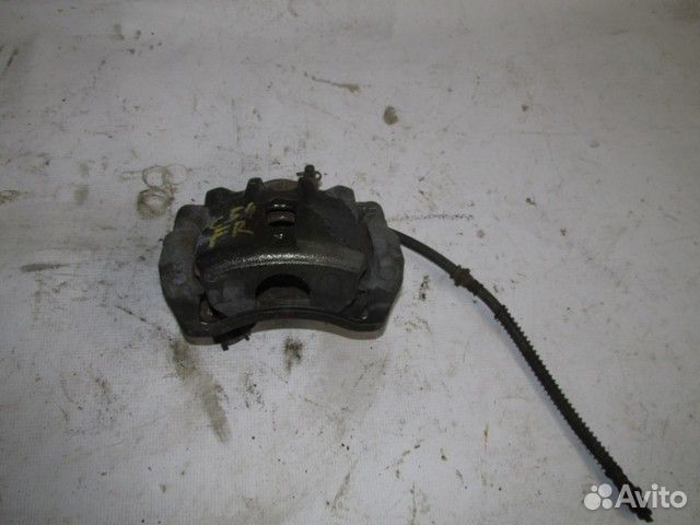 Суппорт тормозной передний правый Hyundai Tucson 1