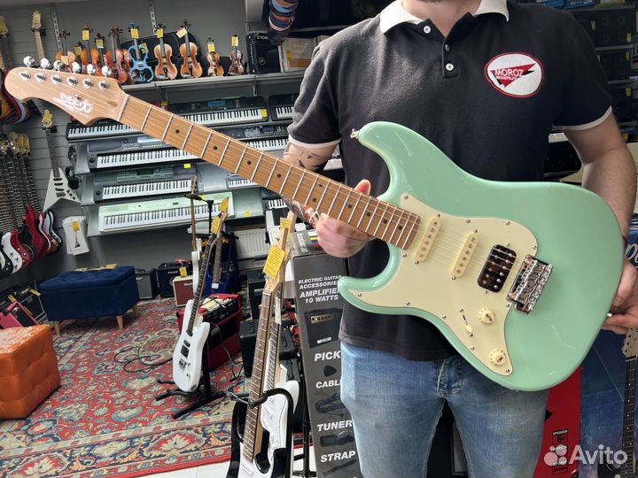 Электрогитара леворукая