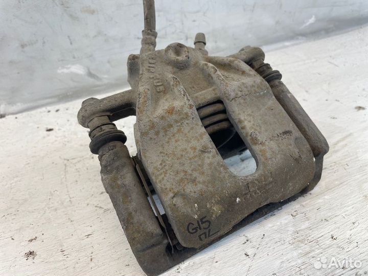 Суппорт передний левый Nissan Almera G15 K4MA490