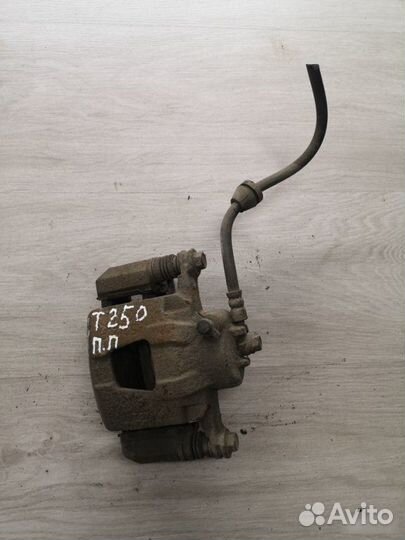 Суппорт передний левый Chevrolet Aveo T250