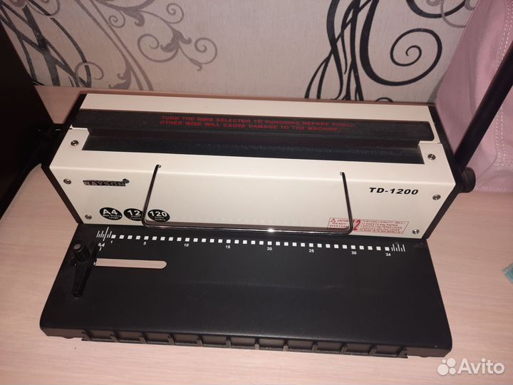 Брошюровщик на металлическую пружину