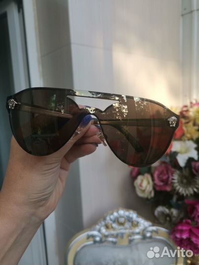 Солнцезащитные очки женские брендовые
