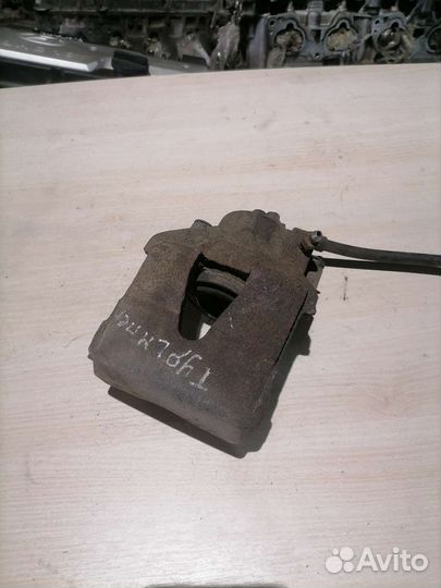 Суппорт передний левый Skoda Octavia Tur