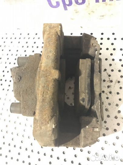 Суппорт тормозной передний правый Volkswagen Trans