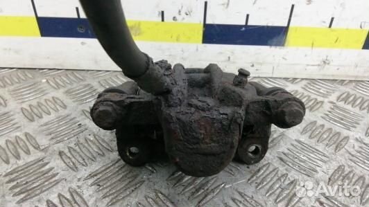 Суппорт тормозной задний правый toyota corolla E12