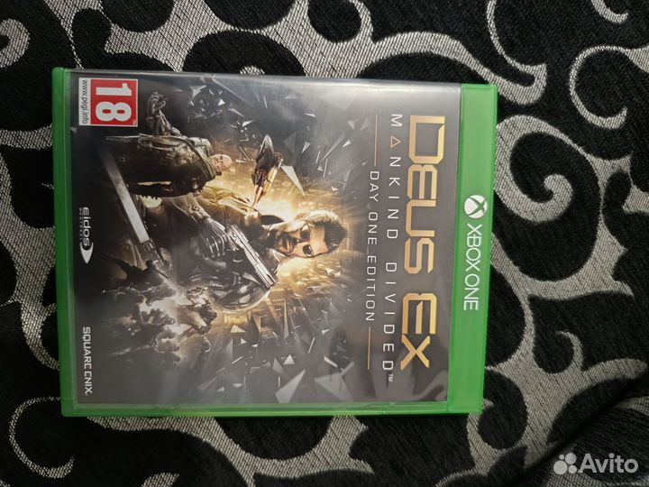 Игра на x box Deus ex mankind divided