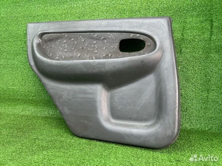 Обшивка двери задняя левая Kia Spectra