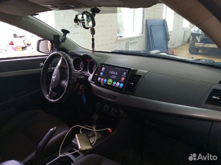 Рамка магнитолы Mitsubishi Lancer X