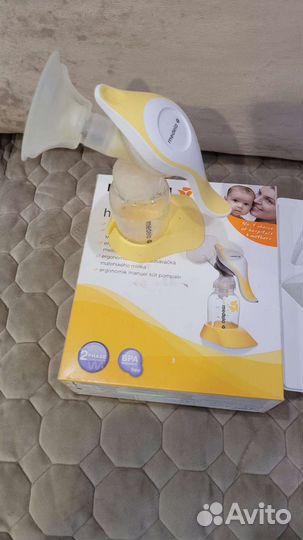 Молокоотсос ручной medela