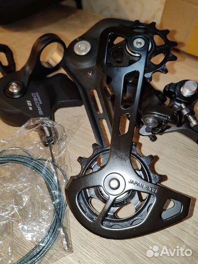 Задний переключатель и манетка Shimano Deore M6100