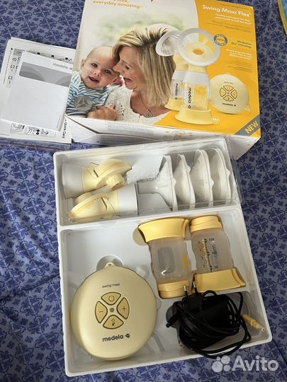 Молокоотсос medela электрический