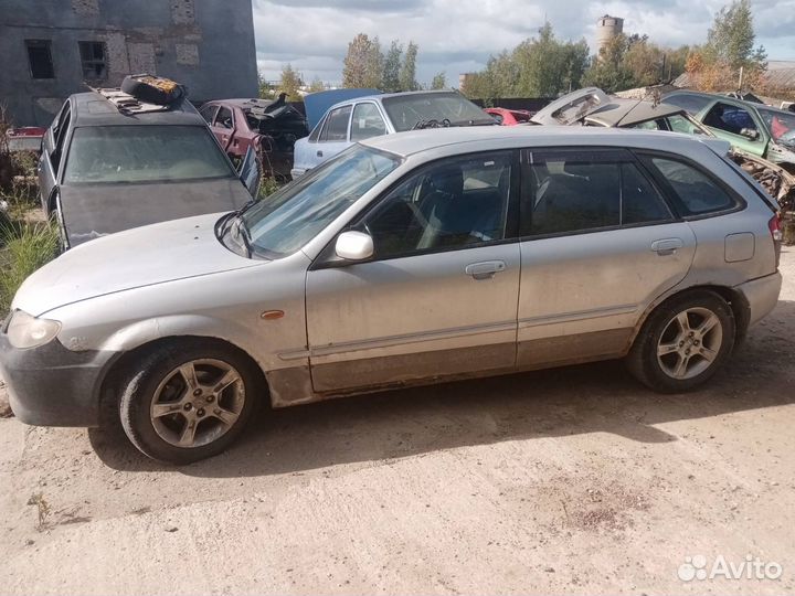Бампер передний Mazda 323 BJ