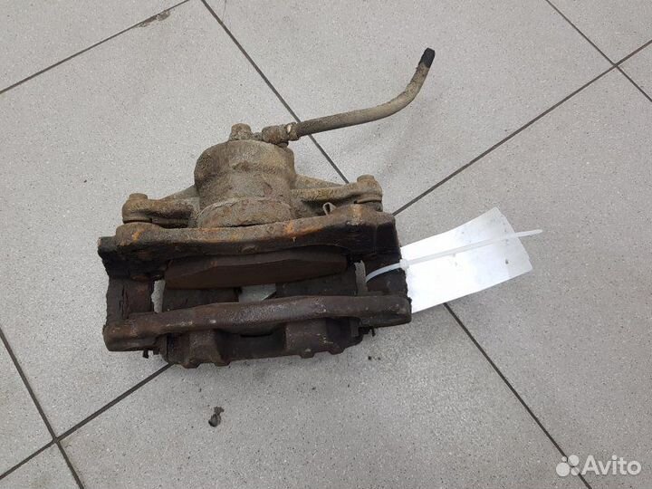 Суппорт тормозной передний правый Toyota Avensis