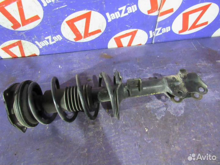 Стойка подвески Nissan Tiida JC11 2004—2012