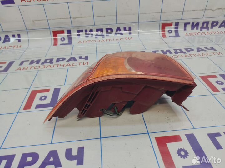 Фонарь задний наружный левый Mitsubishi Lancer X