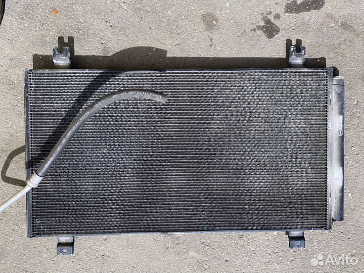 Радиатор кондиционера Mitsubishi Grandis NA4W