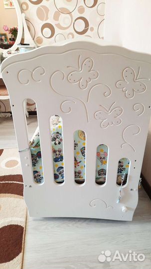 Детская кроватка с продольным маятником