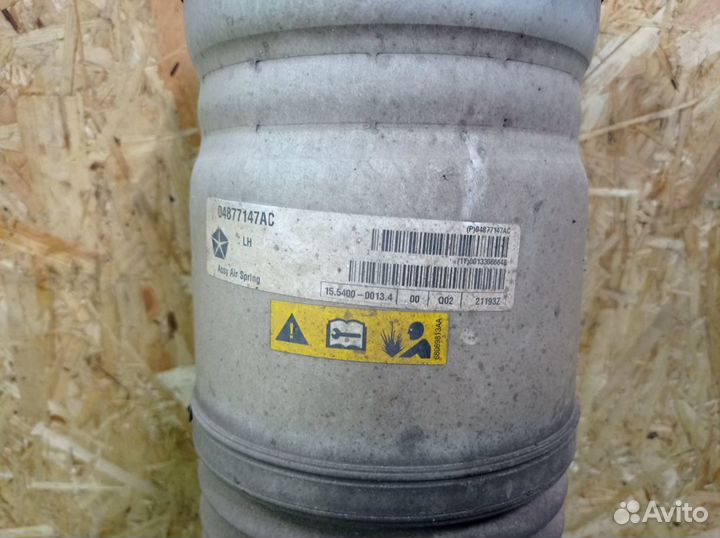 Dodge RAM 1500 пневматический амортизатор левый