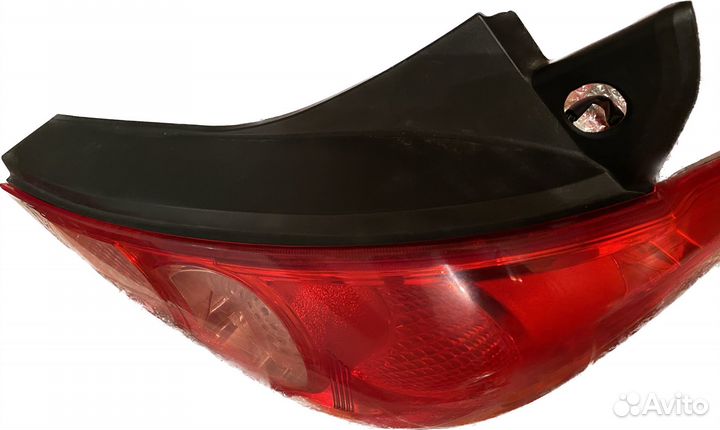 Фонарь задний правый nissan tiida 2010