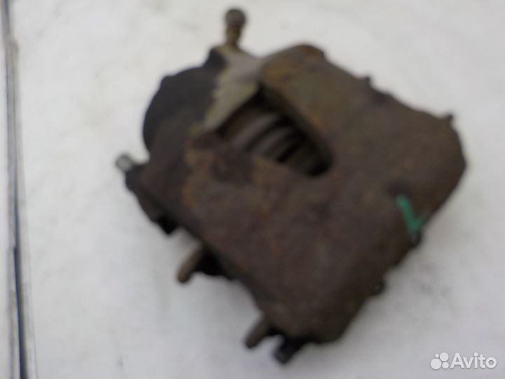 Суппорт тормозной передний левый Skoda Fabia 2007