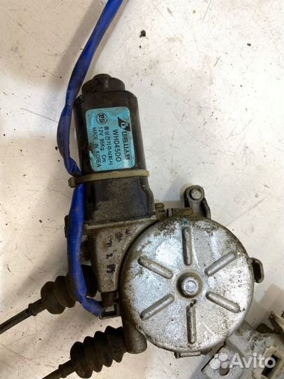 Мотор стеклоподъемника задний правый Kia Spectra