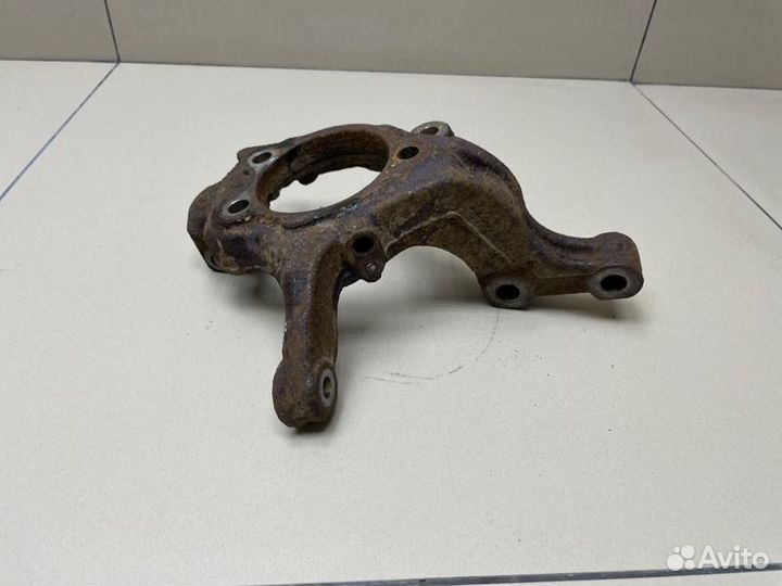 Кулак поворотный передний левый Nissan Tiida