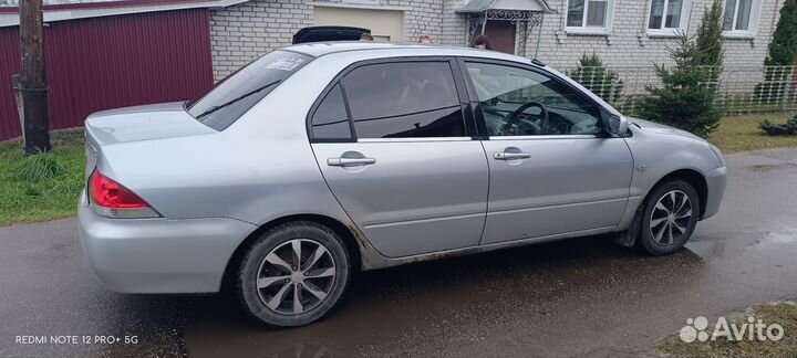 Mitsubishi Lancer 1.5 CVT, 2004, 200 000 км