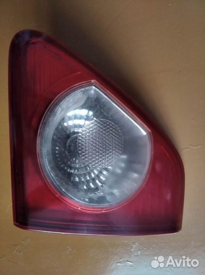 Фонарь задний правый багажника Тойота Королла 150