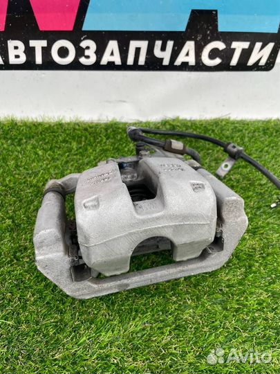 Суппорт тормозной задний правый Tesla Model Y 2021