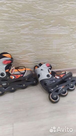 Роликовые коньки