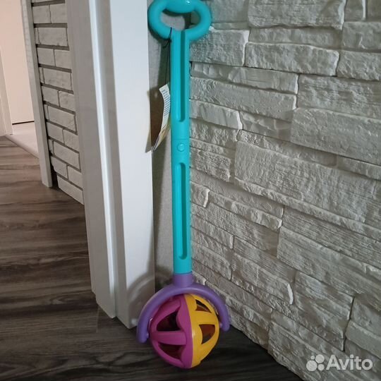 Игрушка каталка