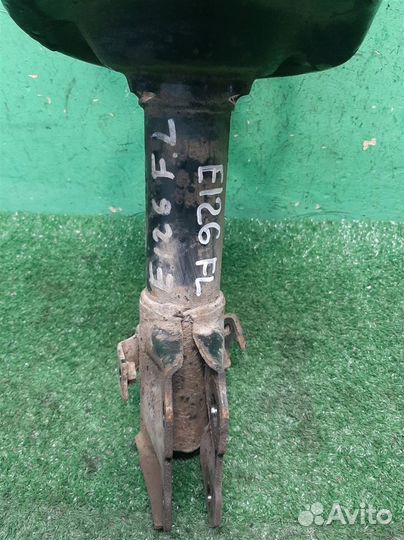 Стойка амортизатора передняя левая Subaru Foreste