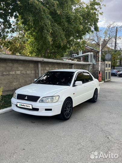 Mitsubishi Lancer Cedia 1.5 CVT, 2002, 215 000 км