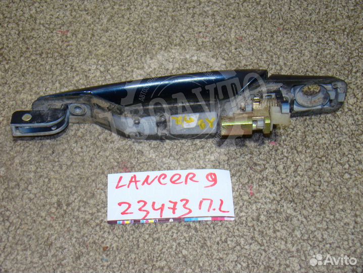 Ручка двери передней наружная левая Mitsubishi La