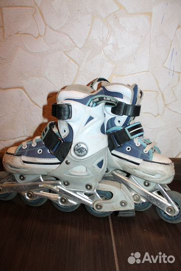 Роликовые коньки