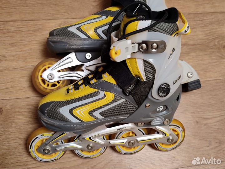 Роликовые коньки